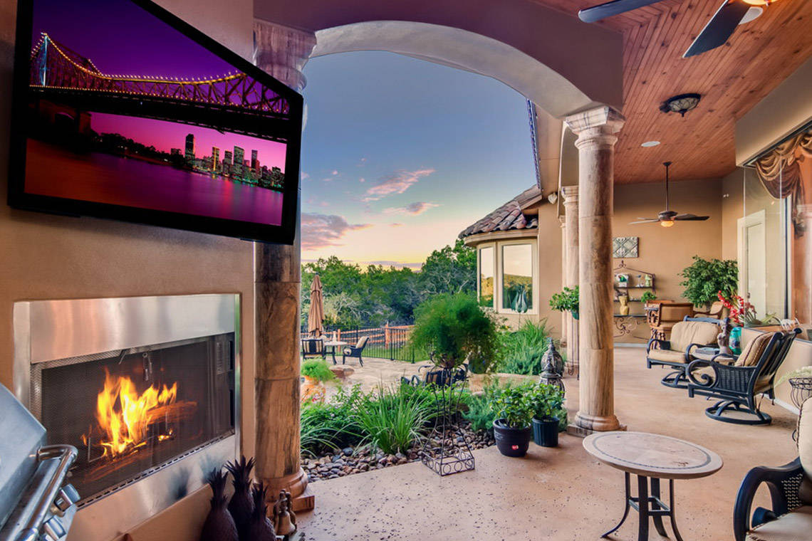 custom designed outdoor fireplace and sitting area